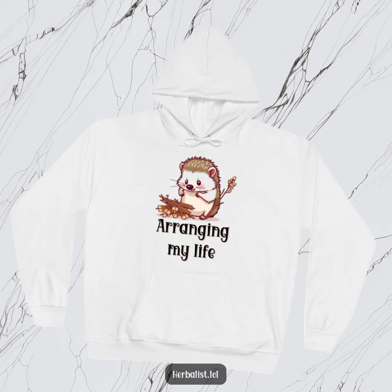 Funny hedgehog herbalist hoodie, determined, arranging dried plants, cozy and humorous attire, amazing funny gift.